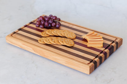 Large Hardwood cutting board with juice groove! Walnut, purple heart, hickory, hard maple, and cherry. 17"x10.5"x1.5"