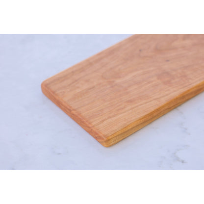 Cherry Charcuterie board: Elevate your gatherings with this stunning 7"x25"x3/4" board. Crafted to perfection, it adds excitement and elegance. A must-have for unforgettable moments.