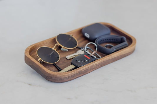Stylish organization with our hardwood valet tray, a cherry catch-all tray that exudes elegance on any desk. This wooden desk organizer, measuring 7"x11"x3/4", is the perfect gift for your husband or boyfriend. Surprise elevate their daily routine.