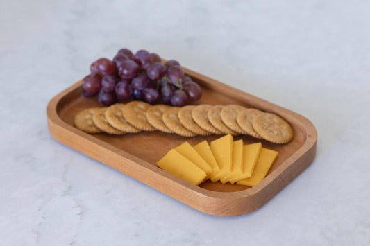 Elevate your dining experience with our captivating cherry serving tray. Meticulously crafted, this 7"x11"x3/4" masterpiece is both functional and a perfect gift. Make festivities special with this exquisite and practical present.